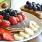 Delicious dairy-free and gluten-free breakfast spread with pancakes, smoothie bowl, and avocado toast